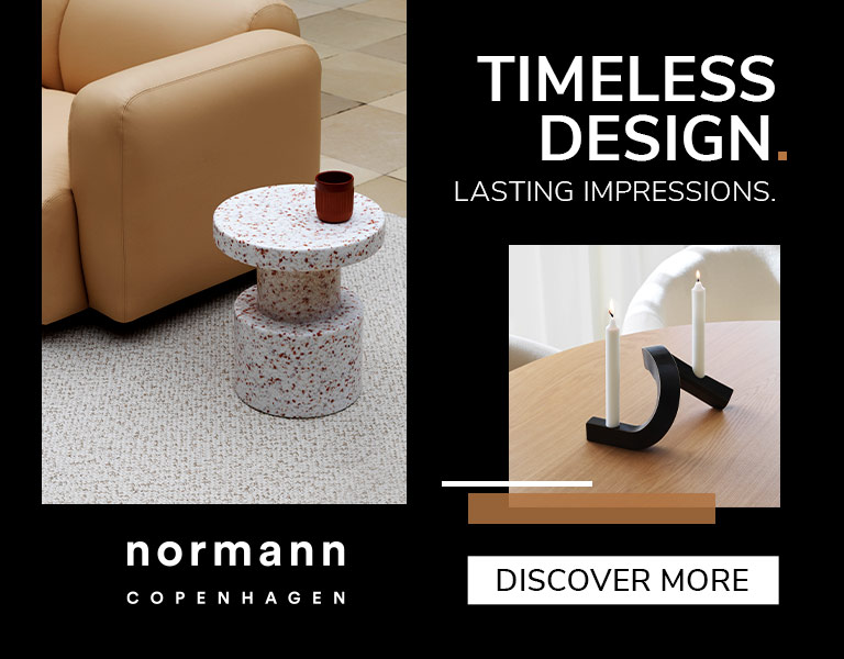 Discover More Modern designer table lamp with gold stem and white shade displayed on natural stone, promoting Black November sale with up to 40% off and text ‘First Black Deals’.